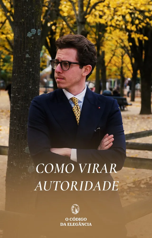 Renzo Schmitz de blazer azul, braços cruzados num parque